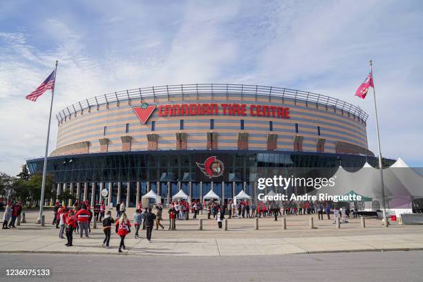 Fans line up to enter Canadian Tire Centre prior to a game between the Ottawa Senators and the New York Rangers on October 23, 2021 in Ottawa,...