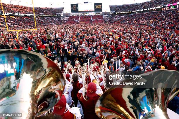 Iowa State Cyclones fans storm the field after the Cyclones defeated the Oklahoma State Cowboys 24-21 at Jack Trice Stadium on October 23, 2021 in...