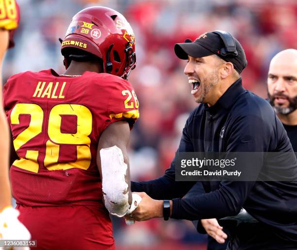 Head coach Matt Campbell of the Iowa State Cyclones celebrates with running back Breece Hall of the Iowa State Cyclones after Hall scored a touchdown...