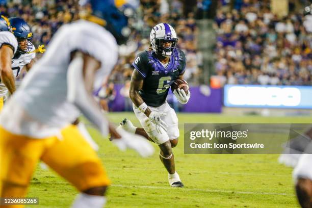 Horned Frogs running back Zach Evans looks for running room during the game between the TCU Horned Frogs and the West Virginia Mountaineers on...