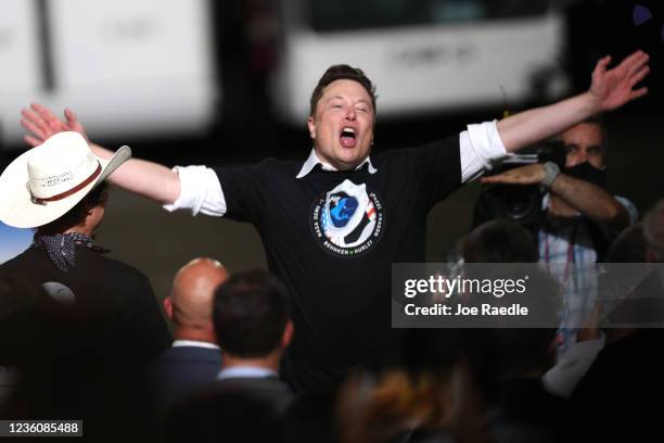 Spacex founder Elon Musk celebrates after the successful launch of the SpaceX Falcon 9 rocket with the manned Crew Dragon spacecraft at the Kennedy...