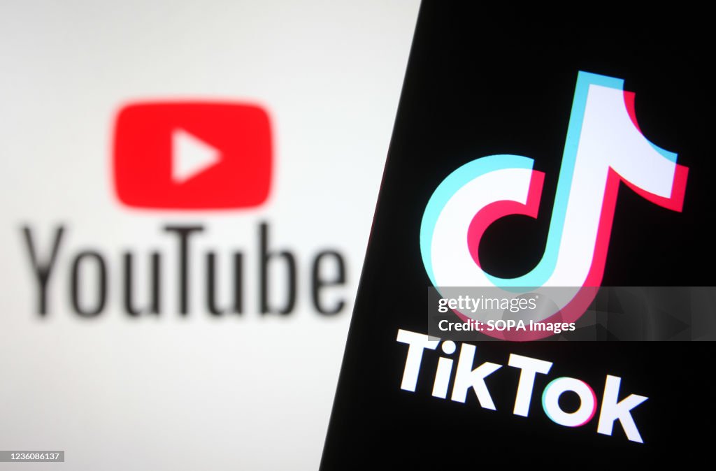 In this photo illustration a TikTok logo is seen on a...
