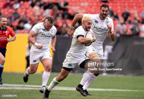 Eagles Nate Augspurger paces forward on his way to a try in the first half during an international Rugby match between the USA Eagles and the New...