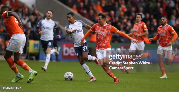 Preston North End's Scott Sinclair and Blackpool's Ryan Wintle during the Sky Bet Championship match between Blackpool and Preston North End at...