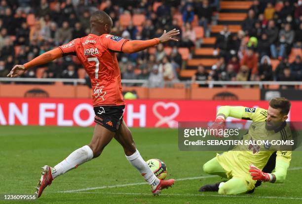 Bordeaux' French goalkeeper Benoit Costil stops a ball of Lorient's Ivorian midfielder Stephane Diarra during the French L1 football match between...