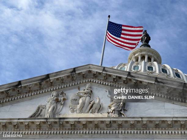 The US Capitol is seen in Washington, DC on October 24, 2021. - After months of fierce political wrangling, House speaker Nancy Pelosi said that she...