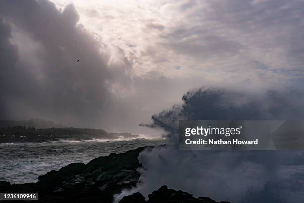 Heavy waves break against the Oregon coast as a bomb cyclone storm system moves over the Northwest United States on October 24, 2021 in Depoe Bay,...