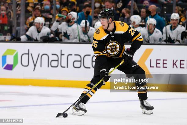 Boston Bruins defenseman Brandon Carlo with the puck during a NHL game between San Jose Sharks and Boston Bruins on October 24 at TD Garden in...