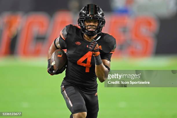 Miami running back Jaylan Knighton takes a reception 53-yards for a touchdown in the second quarter as the University of Miami Hurricanes faced the...