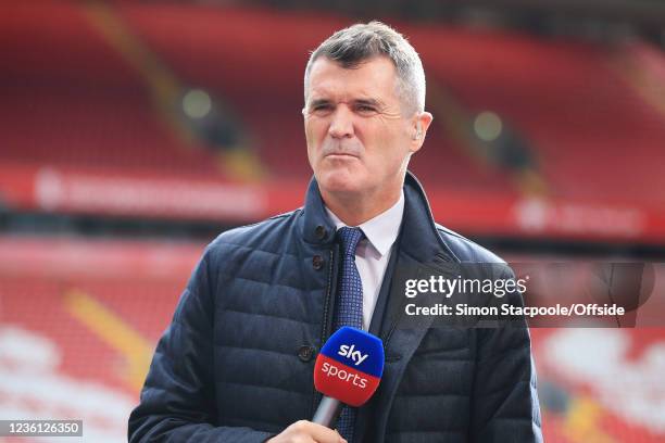 Sky Sports television pundit Roy Keane holds the microphone before the Premier League match between Liverpool and Manchester City at Anfield on...