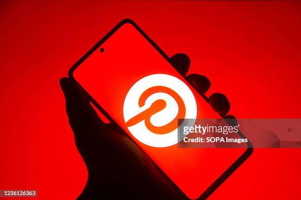 In this photo illustration the Pinterest logo seen displayed on a smartphone.