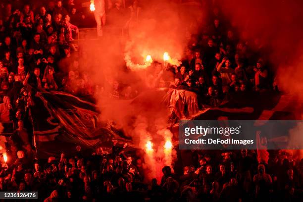 Supporters of Ajax Amsterdam with pyrotechnics during the Dutch Eredivisie match between Ajax and PSV Eindhoven at Johan Cruijff Arena on October 24,...