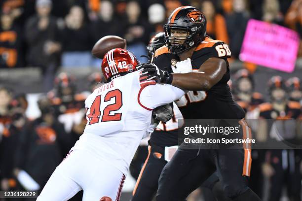 Oregon State Beavers OL Brandon Kipper blocks against Utah Utes DE Mika Tafua during a PAC-12 conference football game between the Utah Utes and...