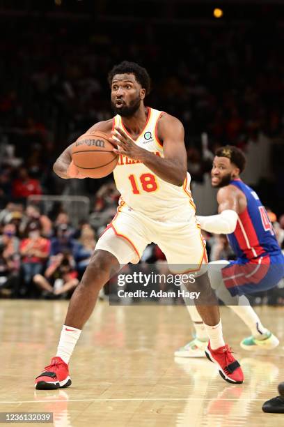 Solomon Hill of the Atlanta Hawks passes the ball against the Detroit Pistons on October 25, 2021 at State Farm Arena in Atlanta, Georgia. NOTE TO...