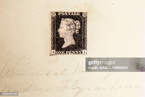 The worlds first postage stamp, the Penny Black, is displayed at Sothebys in Hong Kong on October 26 ahead of its auction in London on December 7...