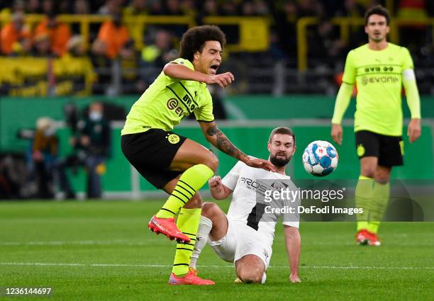 Axel Witsel of Borussia Dortmund and Marc Stendera of FC Ingolstadt 04 battle for the ball during the DFB Cup second round match between Borussia...