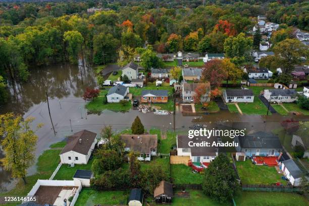 An aerial view of a residential area in Middlesex County as floodwater covers streets that norâeaster left behind flash floods east coast, in New...