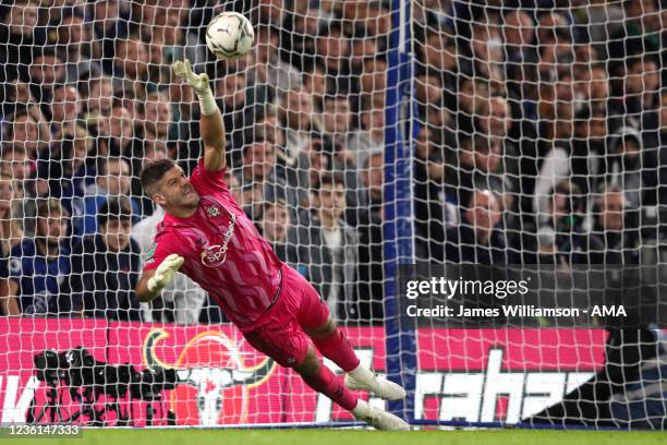 Fraser Forster of Southampton saves a penalty taken by Mason Mount of Chelsea during the penalty shoot out during the Carabao Cup Round of 16 match...