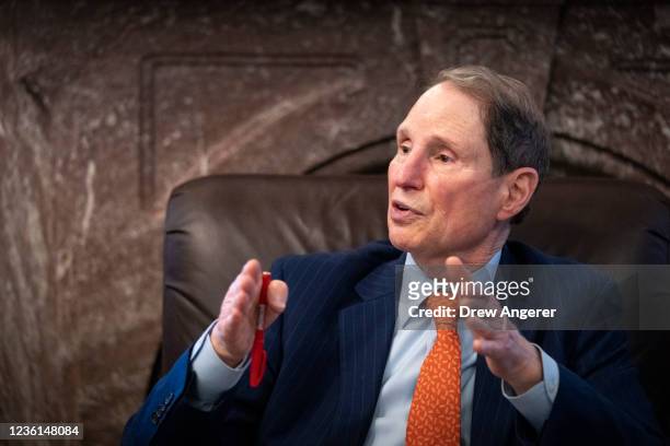 Sen. Ron Wyden speaks to reporters about a corporate minimum tax plan at the U.S. Capitol October 26, 2021 in Washington, DC. The senators detailed a...