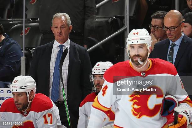 Head Coach Darryl Sutter of the Calgary Flames looks on against against the New Jersey Devils at Prudential Center on October 26, 2021 in Newark, New...