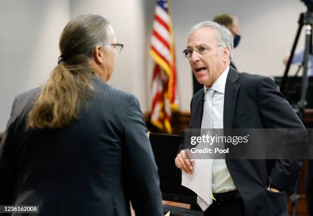 Defense attorneys Franklin Hogue and Robert Rubin speak during the jury selection in the trial of the men charged with killing Ahmaud Arbery at the...