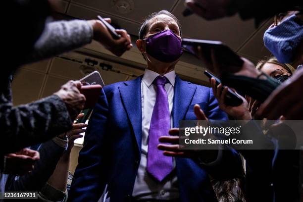 Sen. Ron Wyden talks to reporters in the basement of the U.S. Capitol building on October 27, 2021 in Washington, DC. Democrats are continuing...