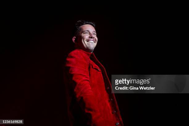 German singer Nico Santos performs live on stage during a concert at Columbiahalle on October 27, 2021 in Berlin, Germany.