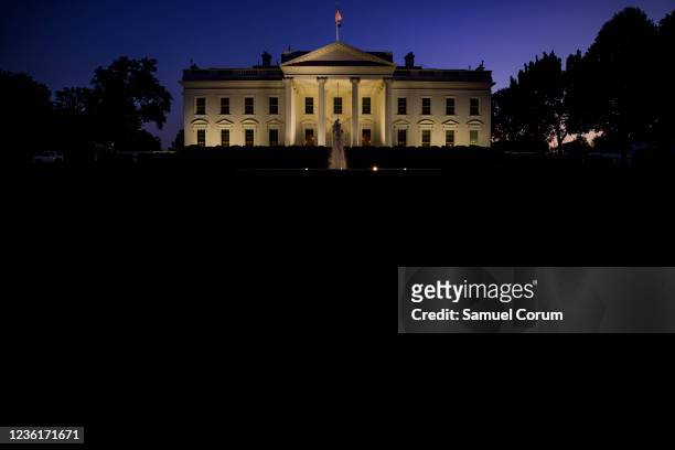 The White House is seen at dusk on the eve of U.S. President Joe Biden's second major foreign trip on October 27, 2021 in Washington, DC. President...