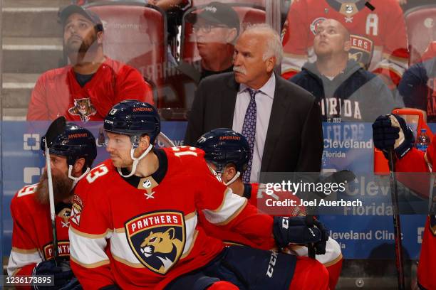 Florida Panthers Head coach Joel Quenneville of the Florida Panthers looks up ice during a line change against the Boston Bruins at the FLA Live...