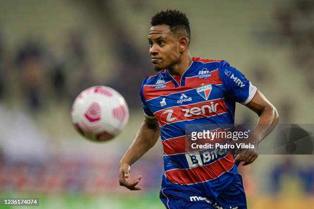 Joao of Matheus Jussa of Fortaleza runs after the ball during a match between Fortaleza and Atletico MG as part of Copa do Brasil Semi-Finals 2021 at...