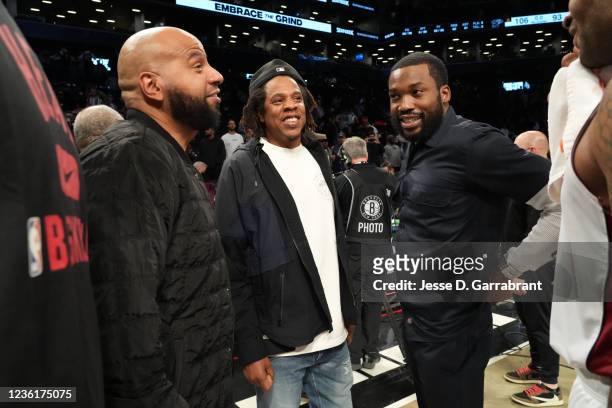 Rappers, Jay-Z and Meek Mill attend a game between the Miami Heat and the Brooklyn Nets on October 27, 2021 at Barclays Center in Brooklyn, New York....
