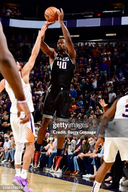 Harrison Barnes of the Sacramento Kings shoots a three point basket at the buzzer to win the game against the Phoenix Suns on October 27, 2021 at...