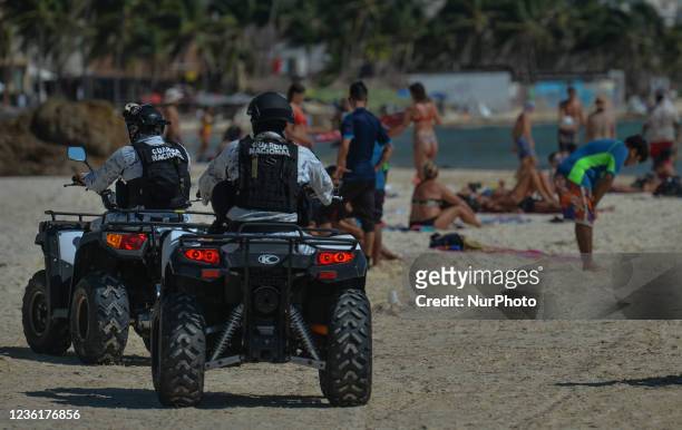 Members of the National Guard patrolling the beach in Playa Del Carmen. On Wednesday, 27 October 2021, in Playa Del Carmen, Quintana Roo, Mexico.