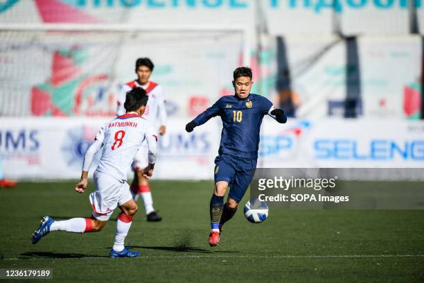 Thanawat Suengchitthawon of Thailand seen in action during the AFC U23 Asian Cup Uzbekistan 2022 Group J qualifying round between Thailand and...