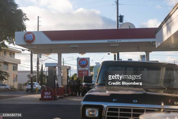 Vehicles at a 76 gas station in the Kaimuki neighborhood of Honolulu, Hawaii, U.S., on Wednesday, Oct. 27, 2021. The national average price for a...