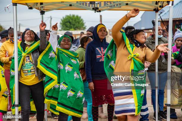 Community members during the African National Congress election campaign on October 26, 2021 in Daveyton, South Africa. The 2021 South African...