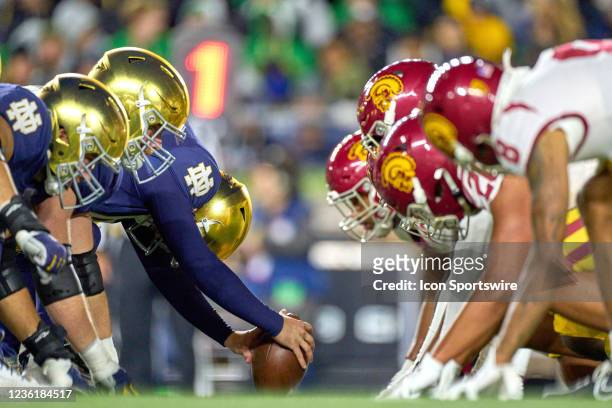 Notre Dame Fighting Irish offensive line sets up across from the USC Trojans defensive line at the line of scrimmage during a game between the USC...