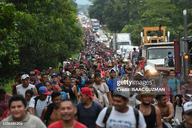 Migrants heading in a caravan to the US, walk towards Mexico City to request asylum and refugee status in Villa Comaltitlan, Chiapas State, Mexico,...