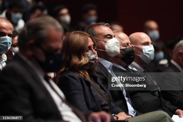 Carlos Ghosn, former Nissan chief executive officer, center, and spouse Carole Ghosn during a roundtable event at St Joseph University in Beirut,...