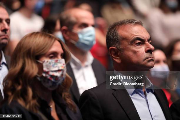 Carlos Ghosn, former Nissan chief executive officer, right, and spouse Carole Ghosn during a roundtable event at St Joseph University in Beirut,...