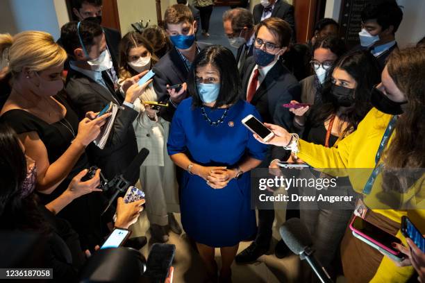 Rep. Pramila Jayapal speaks to reporters as she leaves a meeting with Progressive House Democrats at the U.S. Capitol October 28, 2021 in Washington,...