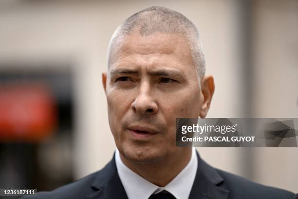 The prefect of the French administrative department of Herault Hugues Moutouh arrives in Montpellier's city centre after a police operation related...
