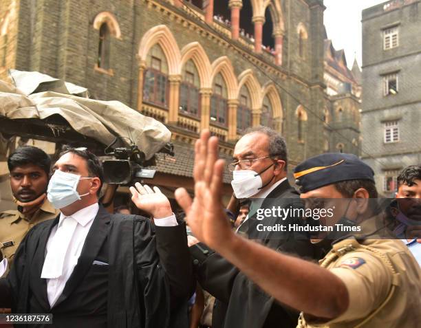 Lawyer Mukul Rohatgi along with Satish Maneshinde address the media after Aryan Khan gets bail from Bombay High Court on October 28, 2021 in Mumbai,...