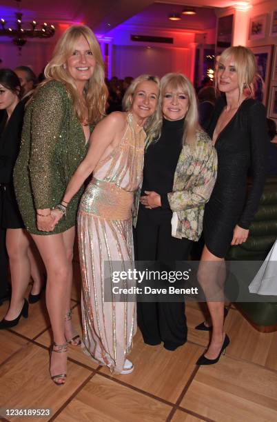 Penny Lancaster, Leah Wood, Jo Wood and Kimberly Stewart attend the Langan's Launch Night on October 28, 2021 in London, England.