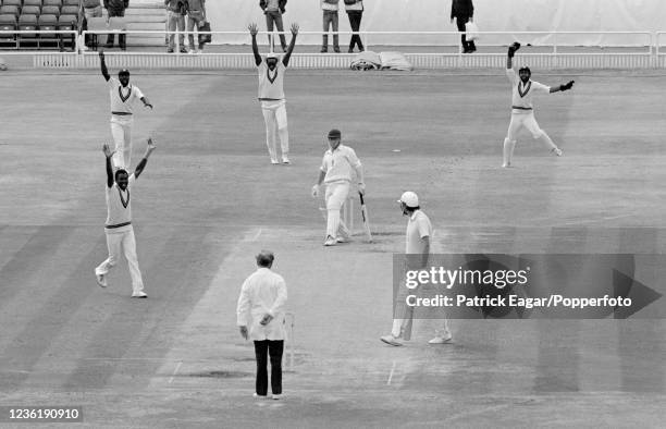 Paul Downton of England is caught for 27 runs by West Indies wicketkeeper Jeffrey Dujon off Malcolm Marshall, bowling with a double fracture to his...