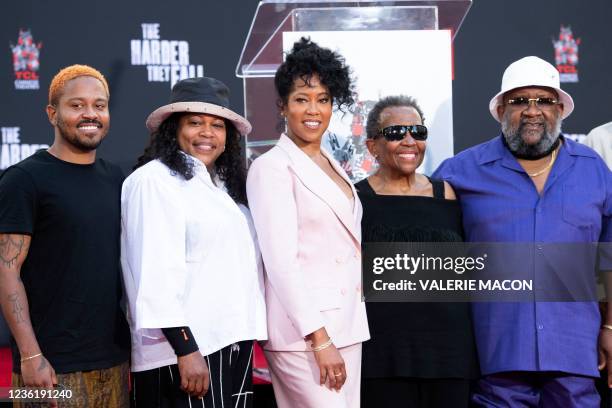 Ian Alexander Jr., Reina King, actress Regina King, Gloria King and Thomas King pose after Regina's Hand and Footprint Ceremony at the TCL Chinese...