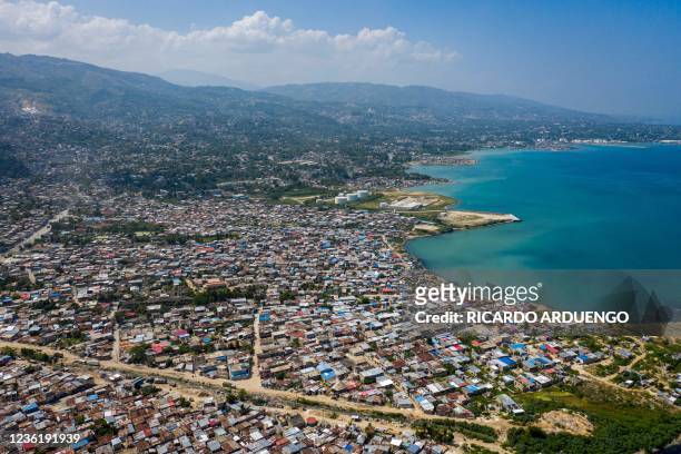 Aerial view of the Martissant neighborhood of Port-au-Prince, Haiti, on October 28, 2021. - Already burdened by months of political chaos and natural...
