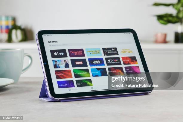 Detail of the Apple TV streaming app on the screen of an Apple iPad Mini, taken on October 6, 2021.