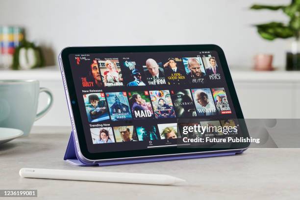 Detail of the Netflix streaming app on the screen of an Apple iPad Mini, taken on October 6, 2021.