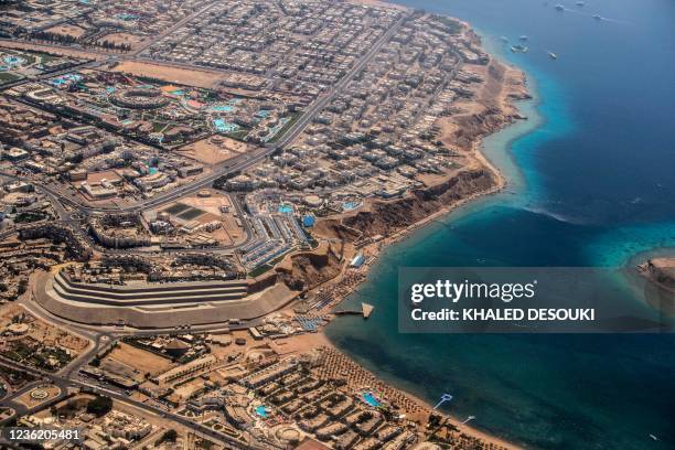 This picture taken on September 27, 2021 shows an aerial view of residential lots and luxury hotels in the Hadaba district of the Egyptian Red Sea...